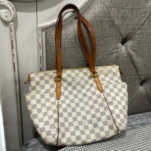 Bought used.Seller said authenticated on Mercari. Some visible wear-see pics.